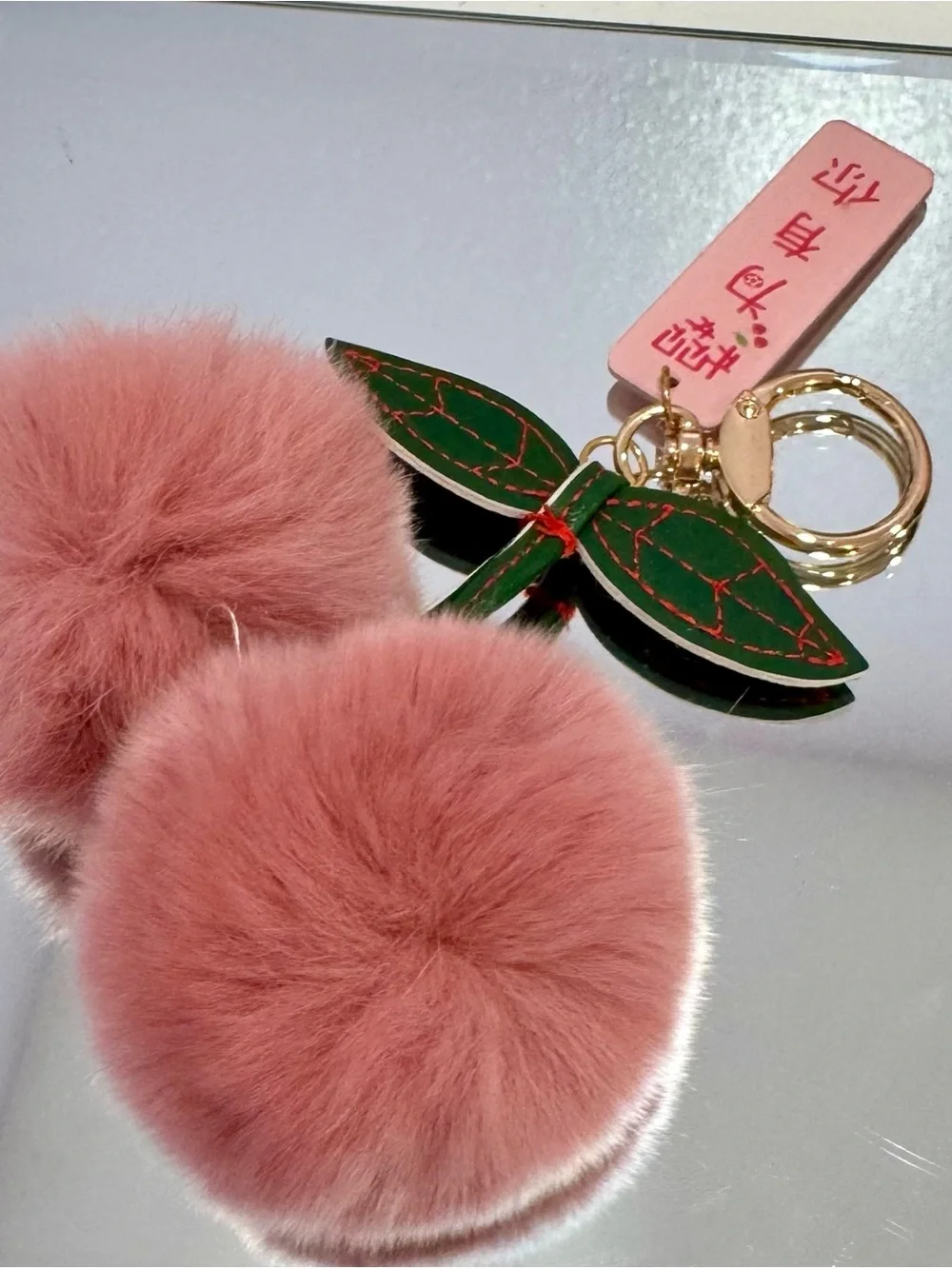 New Pink Faux Fur Pom Pom Cherry Keychain with Green Leaf Accent